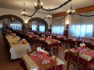 A restaurant or other place to eat at Albergo Ristorante Poli