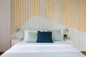 Posteľ alebo postele v izbe v ubytovaní Acropolis Core Bright & Modern Apartment by UPSTREET