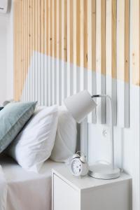 Posteľ alebo postele v izbe v ubytovaní Acropolis Core Bright & Modern Apartment by UPSTREET