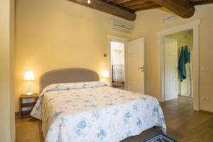 Posteľ alebo postele v izbe v ubytovaní Santo Stefano 10 by Salogi Villas
