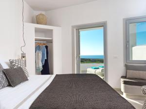 Postel nebo postele na pokoji v ubytování Myst Boutique Hotel