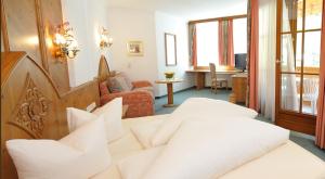 Posteľ alebo postele v izbe v ubytovaní Hotel Garni Castel B&B
