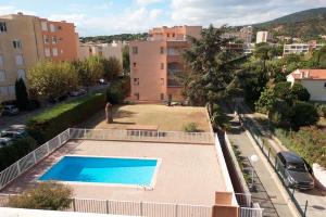 a view of a swimming pool from a building at Maxime plage in Sainte-Maxime