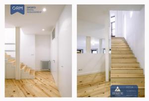 ポルトにあるORM - Bainharia Apartmentの白壁・木製の床の家の階段