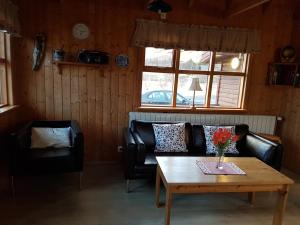 Posezení v ubytování Ásólfsskáli Cottage