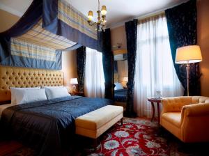 Postel nebo postele na pokoji v ubytování Grande Bretagne - Nafplio