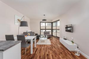 TV a/nebo společenská místnost v ubytování Chill Apartments City Link