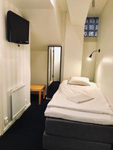 
Säng eller sängar i ett rum på Stockholm Hostel
