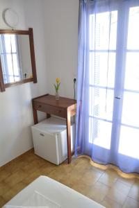 Ванная комната в Nefeli rooms Ios