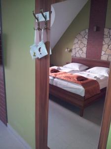 Letto o letti in una camera di Hotel Vinopa