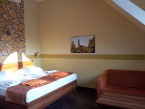 Letto o letti in una camera di Hotel Vinopa