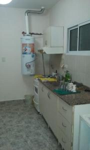 Una cocina o kitchenette en Departamentos Niñas