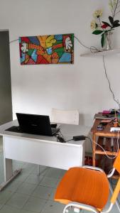 TV a/nebo společenská místnost v ubytování Casa Thayla Pousada