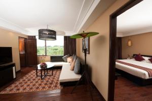 Katil atau katil-katil dalam bilik di Rose Garden Hotel