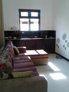 Posezení v ubytování Apna Homestay Apartments