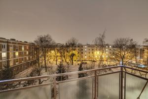 Budova, v ktorej sa apartmán nachádza + 5 fotografií