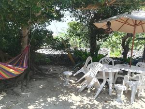 Сад в Taketomijima Guesthouse and je Taime