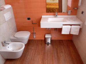 Koupelna v ubytování Hotel Confine