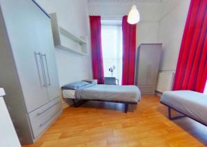 Ένα ή περισσότερα κρεβάτια σε δωμάτιο στο Belvedere House (Gloucester Road) +11 φωτογραφίες