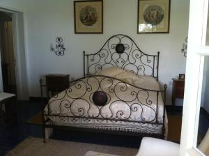Кровать или кровати в номере Villa Tregia