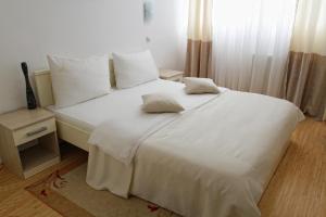 Giường trong phòng chung tại Garni Hotel Hamburg