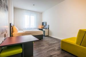 TV a/nebo společenská místnost v ubytování Hostel Art & Style