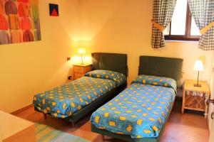 Ένα ή περισσότερα κρεβάτια σε δωμάτιο στο Casa Faggio