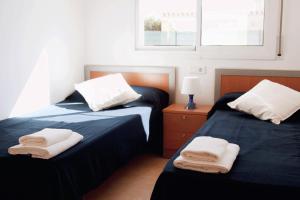 Cama o camas de una habitación en Casa Marga
