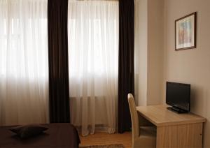 TV/trung tâm giải trí tại Garni Hotel Hamburg