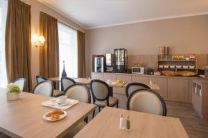 Kuchyň nebo kuchyňský kout v ubytování Hotel Paganini