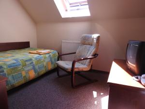 Posteľ alebo postele v izbe v ubytovaní Noclegi u Eichendorffa