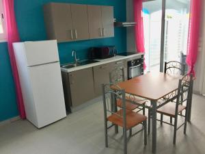 Kuchyň nebo kuchyňský kout v ubytování Le Domaine Turquoise