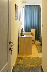 Giường trong phòng chung tại Garni Hotel Hamburg