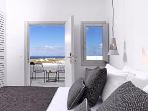 Postel nebo postele na pokoji v ubytování Myst Boutique Hotel