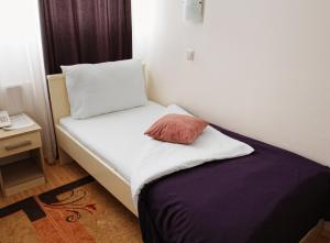 Giường trong phòng chung tại Garni Hotel Hamburg