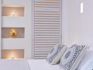 Postel nebo postele na pokoji v ubytování Myst Boutique Hotel