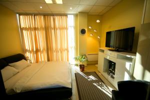 Postel nebo postele na pokoji v ubytování Hotel Fortuna