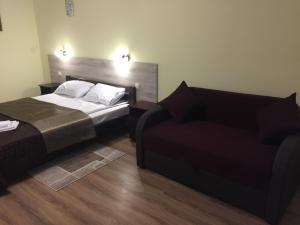 Postel nebo postele na pokoji v ubytování Hotel Karpaty