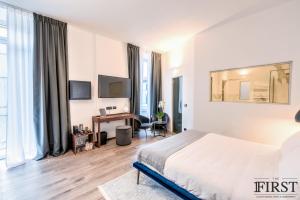 TV a/nebo společenská místnost v ubytování La Spezia by The First - Luxury Rooms & Suites