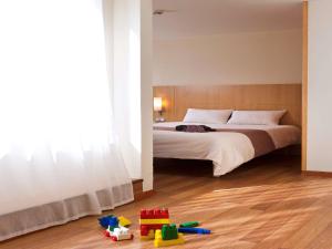 Ліжко або ліжка в номері ibis Hotel Brussels Expo Atomium
