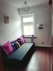 Posteľ alebo postele v izbe v ubytovaní Apartament Szczawno-Zdrój