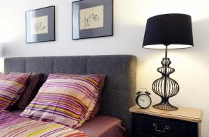 Łóżko lub łóżka w pokoju w obiekcie Apartment Theresiengasse