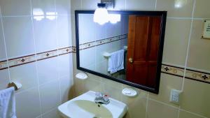 Ванная комната в Hotel Las Americas