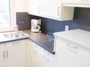 Küche/Küchenzeile in der Unterkunft Ferienwohnung *Wibkes Hüs*