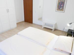 Ein Bett oder Betten in einem Zimmer der Unterkunft Ferienwohnung *Wibkes Hüs*