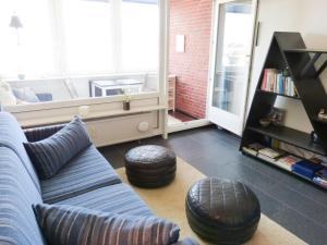 TV a/nebo společenská místnost v ubytování Ferienwohnung *Mein Meerblick*