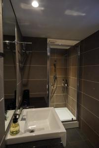 Koupelna v ubytování Conne Hotel