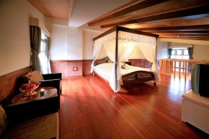 Postel nebo postele na pokoji v ubytování Dream Forest Villa
