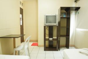 TV a/nebo společenská místnost v ubytování GV Hotel - Valencia