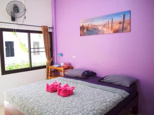Postel nebo postele na pokoji v ubytování Runa Runa The Best Samed Island